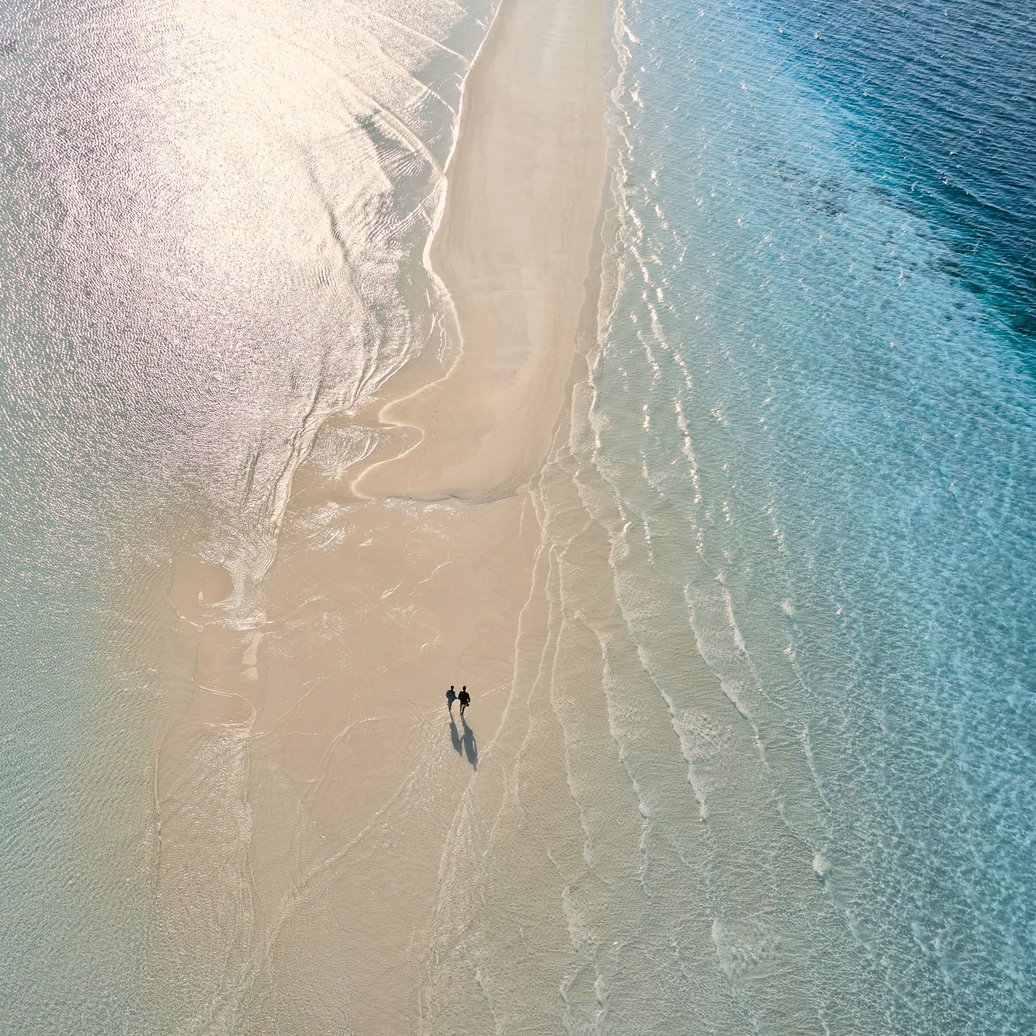 A Person Flying Through The Air While Riding A Wave